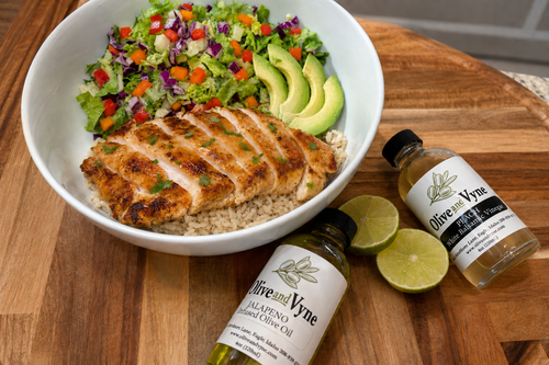Peach-Jalapeño Glazed Chicken served over brown rice with chopped salad and avocado.