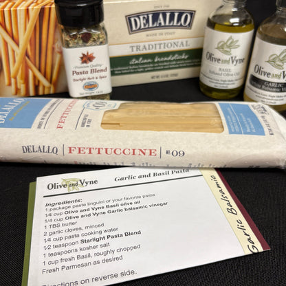 Basil and Garlic pasta recipe card with DeLallo fettuccine, breadsticks, Olive & Vyne oils, and Starlight Pasta Blend.