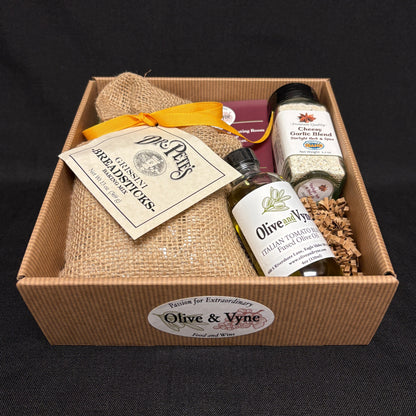 Breadstick Mix gift box with Dr. Pete’s Grissini Breadsticks Mix, Italian Tomato Blend Fused Olive Oil, Cheesy Garlic Blend, and gift packaging.