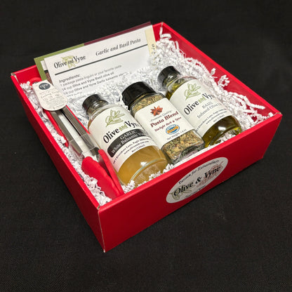 Garlic Balsamic & Basil pasta gift box with Garlic White Balsamic, Basil Infused Olive Oil, Pasta Blend seasoning, mini tongs, and recipe card.