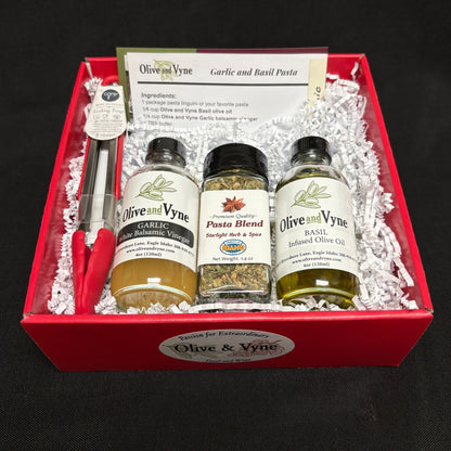 Open Garlic Balsamic & Basil pasta gift box with Olive & Vyne products, Pasta Blend seasoning, mini tongs, and recipe card.