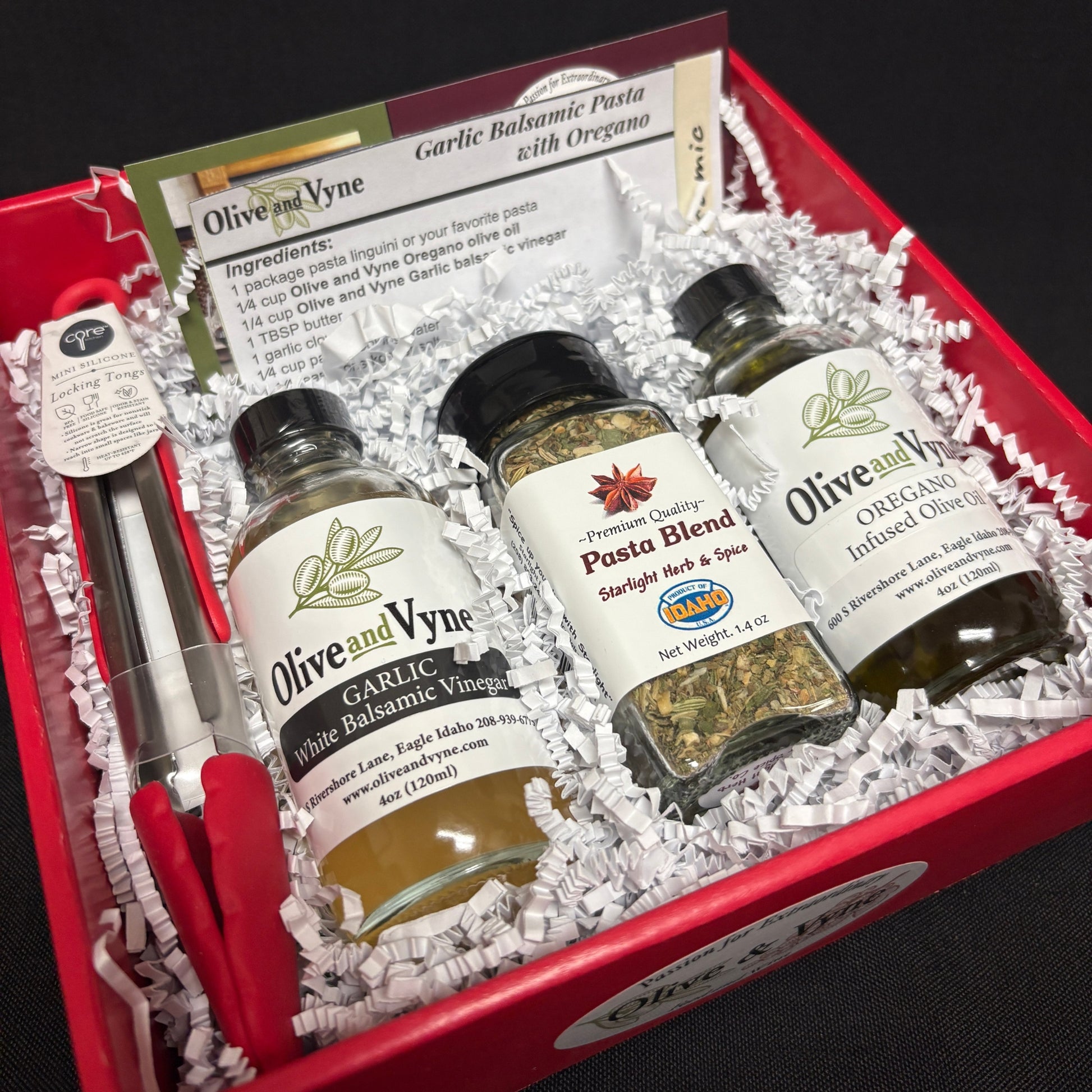 Garlic Balsamic & Oregano Pasta Lovers gift box with olive oil, balsamic, pasta seasoning, mini tongs, and recipe card.