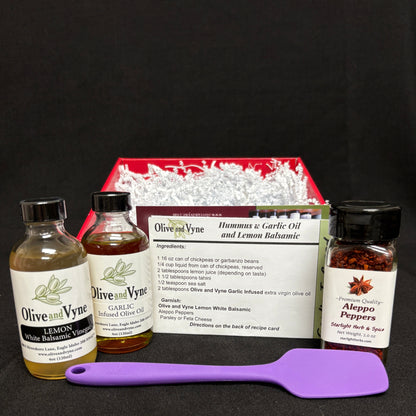Garlic Infused Olive Oil, Lemon White Balsamic, Aleppo Pepper, mini silicone spatula, and hummus recipe card.