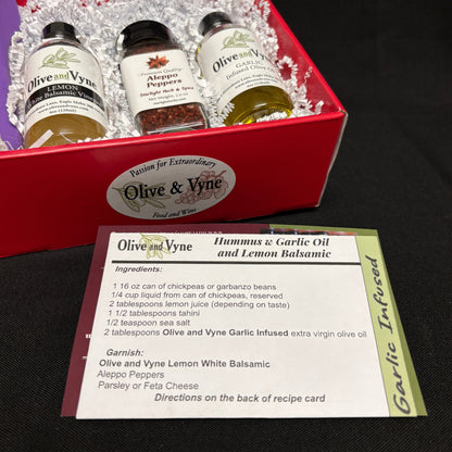 Hummus recipe card with Garlic Infused Olive Oil, Lemon White Balsamic, and Aleppo Pepper from Starlight Herb & Spice.
