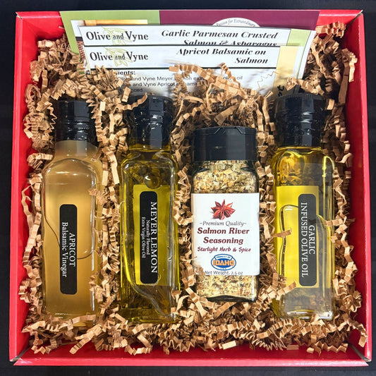 Open Salmon Lovers Gift Box showing Apricot Balsamic, Meyer Lemon EVOO, Garlic EVOO, Salmon River Seasoning, and recipe cards